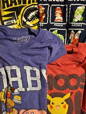 Lot of 4 Men's Small Graphic Tees.